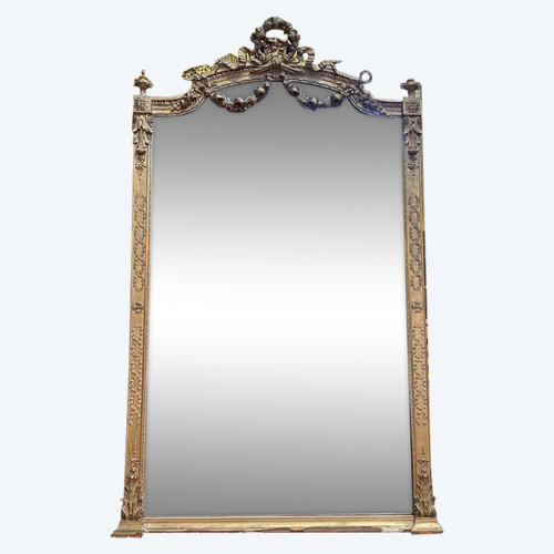 Miroir de style Louis XVI en bois doré