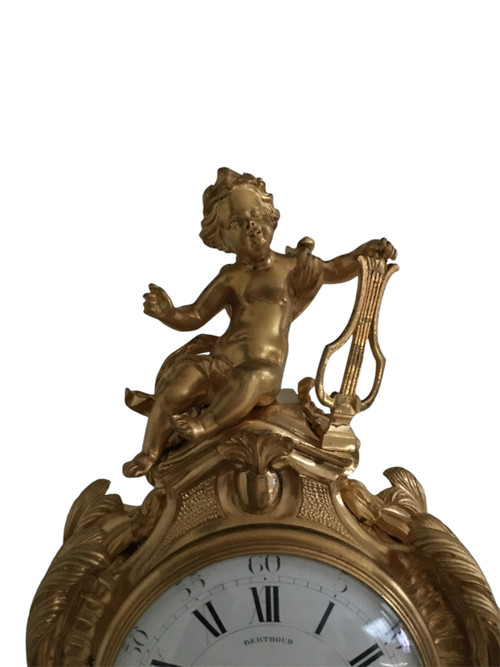 Orologio in bronzo dorato, XIX periodo di transizione Luigi XV/XVI
