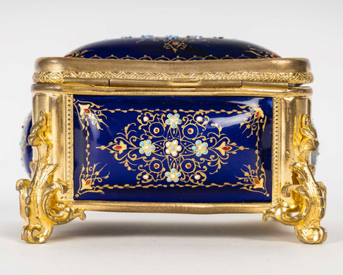 A box of enamel and gilded bronze jewelry, late 19th century