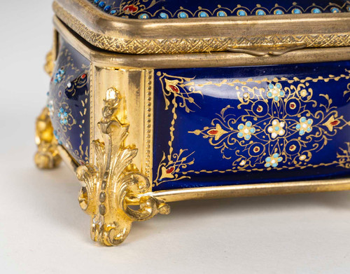 A box of enamel and gilded bronze jewelry, late 19th century