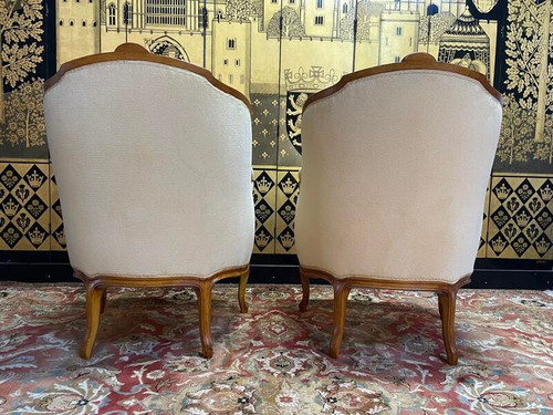 Paire de fauteuils bergères gondoles de style Louis XV
