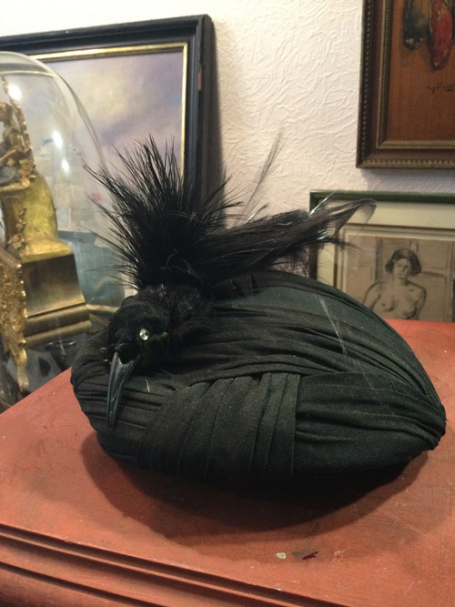 Evening hat with bird