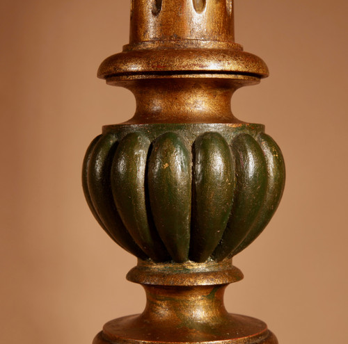 A pair of highly decorative Italian Renaissance style turned and carved giltwood floor lamps