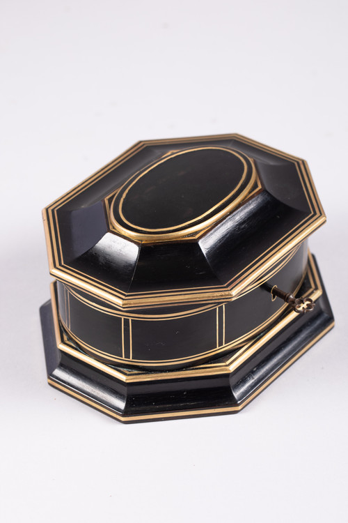 TAHAN House in Paris. Ebony and brass threaded jewelry box with cut sides