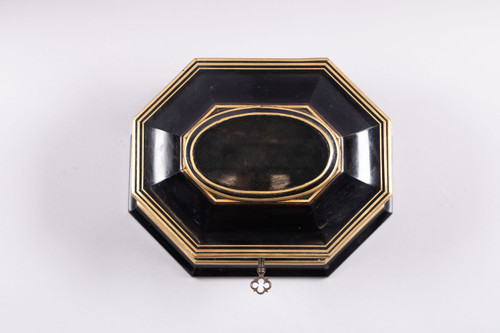 TAHAN House in Paris. Ebony and brass threaded jewelry box with cut sides
