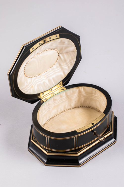 TAHAN House in Paris. Ebony and brass threaded jewelry box with cut sides