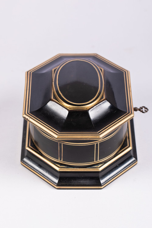 TAHAN House in Paris. Ebony and brass threaded jewelry box with cut sides