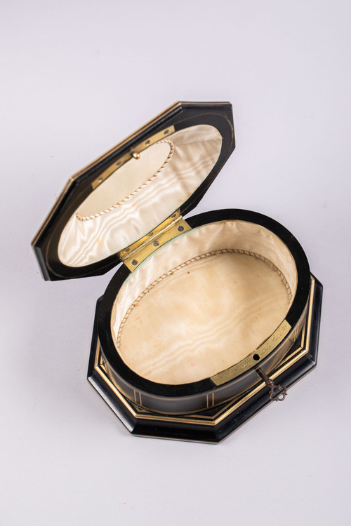 TAHAN House in Paris. Ebony and brass threaded jewelry box with cut sides