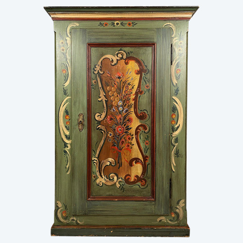 Alsatian bonnet maker in painted softwood with floral decorations