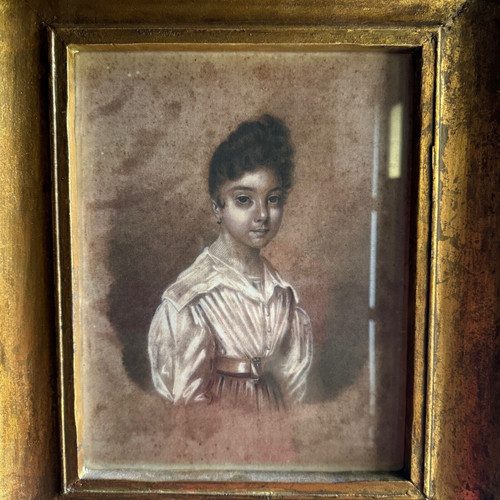 Early 19th century drawing representing a young girl in a gilded frame