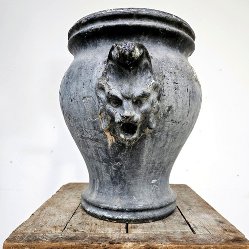 Pair of enameled cast iron Rouen vases