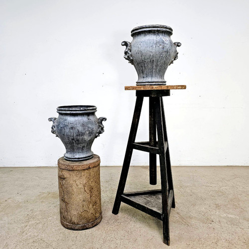 Pair of enameled cast iron Rouen vases
