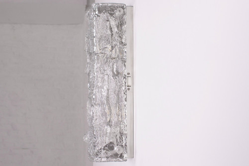 An Ice Glass bark wall sconce.