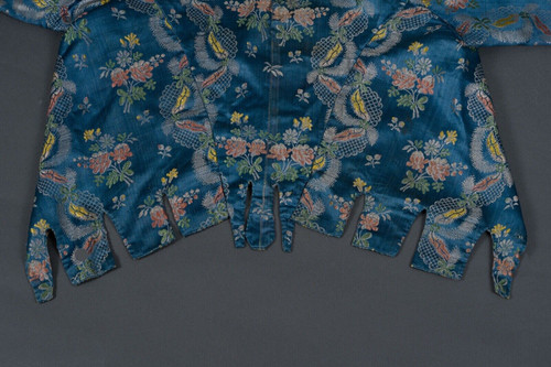 Hand-embroidered 17th or 18th century bolero jacket with floral and lace decoration