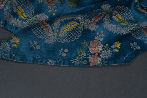 Hand-embroidered 17th or 18th century bolero jacket with floral and lace decoration