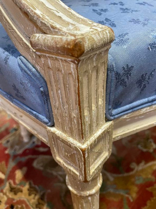 Paire de fauteuils cabriolets de style Louis XVI