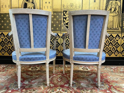 Paire de fauteuils cabriolets de style Louis XVI