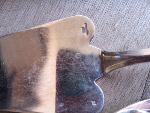 A set of silver-plated América Christofle cake servers