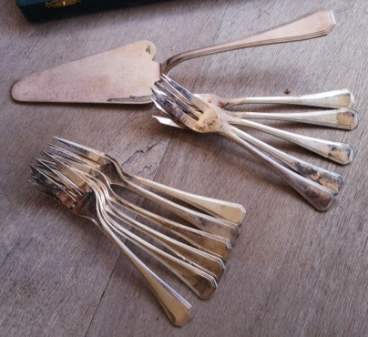 A set of silver-plated América Christofle cake servers