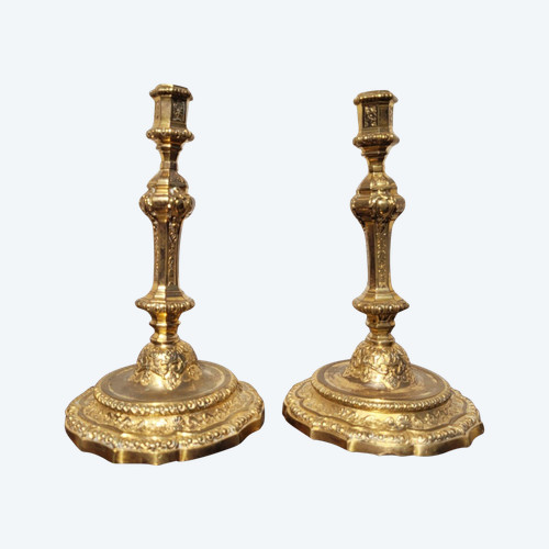 Coppia di candelieri al mercurio in bronzo dorato, XIX secolo