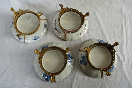 Suite of 4 Japanese porcelain bronze-mounted plates with Imari decoration