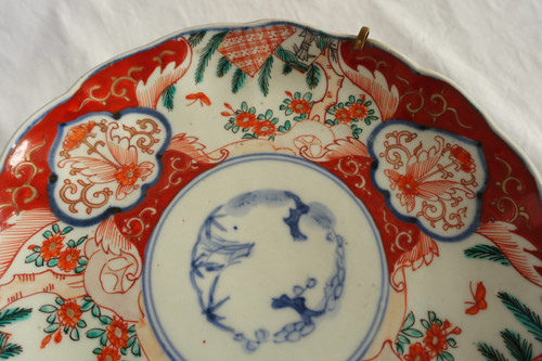 Suite of 4 Japanese porcelain bronze-mounted plates with Imari decoration