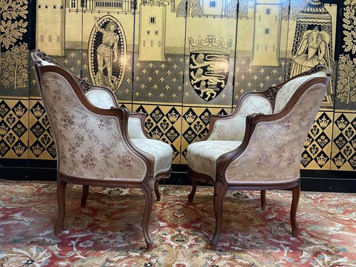 Paire de fauteuils bergères rocailles Louis XV