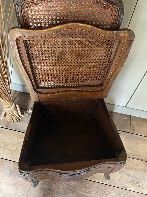Louis XV commode chair from the 18th century in walnut