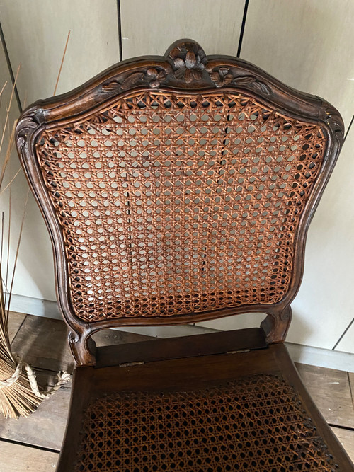 Louis XV commode chair from the 18th century in walnut