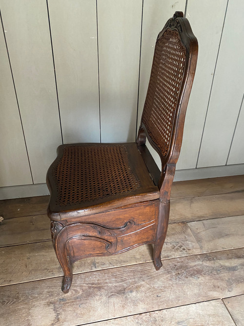 Louis XV commode chair from the 18th century in walnut
