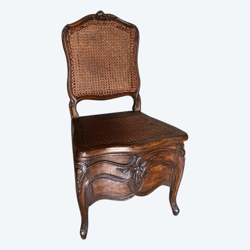Louis XV commode chair from the 18th century in walnut