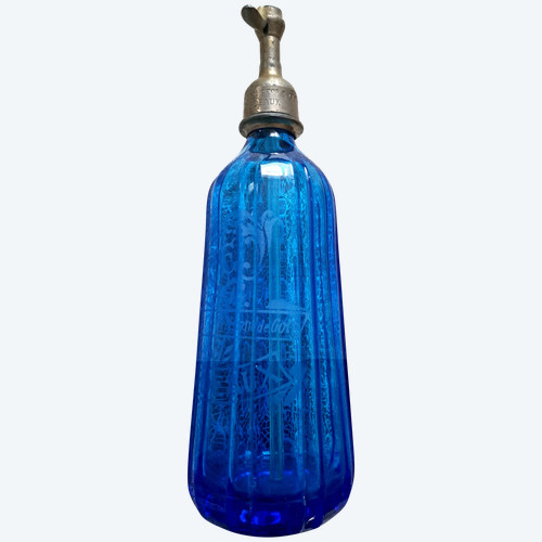 Old pyramidal siphon with blue facets for drinks in Bordeaux