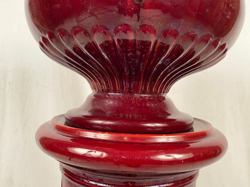 Complete with red glazed ceramic planter on column