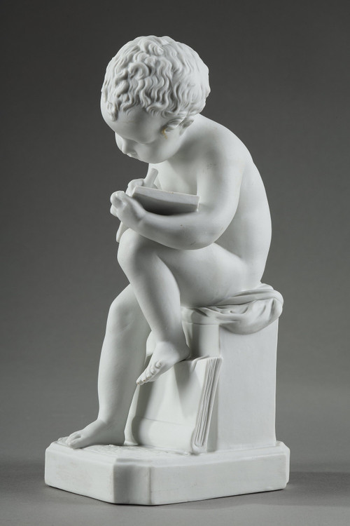 TWO SUBJECTS AT BISCUIT REPRESENTING THE CHILD READING AND THE CHILD DRAWING