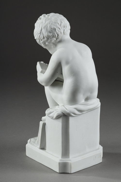 TWO SUBJECTS AT BISCUIT REPRESENTING THE CHILD READING AND THE CHILD DRAWING