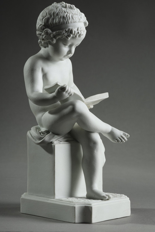 TWO SUBJECTS AT BISCUIT REPRESENTING THE CHILD READING AND THE CHILD DRAWING