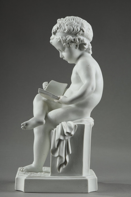 TWO SUBJECTS AT BISCUIT REPRESENTING THE CHILD READING AND THE CHILD DRAWING