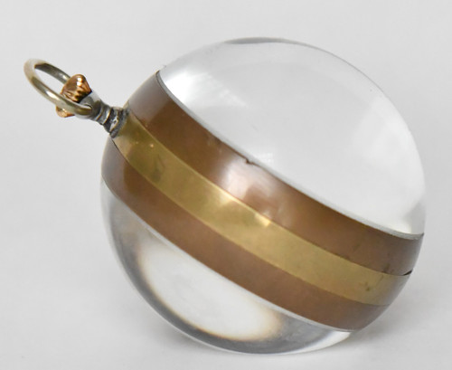 Ball-shaped glass desk clock with erotic decoration