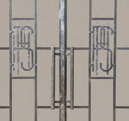 Two Exceptional Art Deco Period Arched Bay Windows in Hammered and Chiseled Wrought Iron