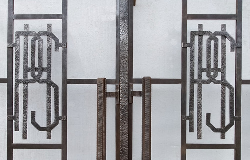 Two Exceptional Art Deco Period Arched Bay Windows in Hammered and Chiseled Wrought Iron