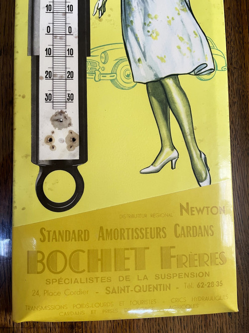 Advertisement thermometer for Newton garage shock absorbers