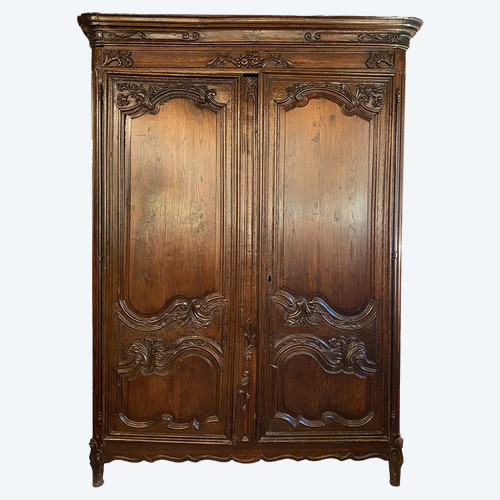 Mobile in rovere intagliato e decorato con foglie e fiori, fine XVIII secolo