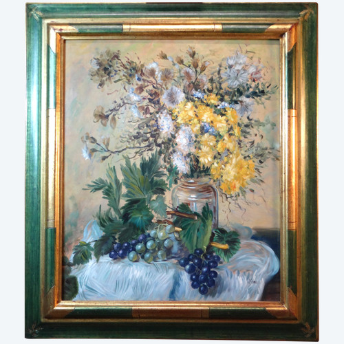 Ecole française XXème siècle. Bouquet de fleurs. Huile sur panneau. Signée Leas