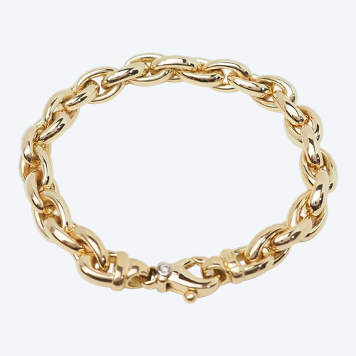 Bracelet souple maille forçat ovale en or jaune et diamant 