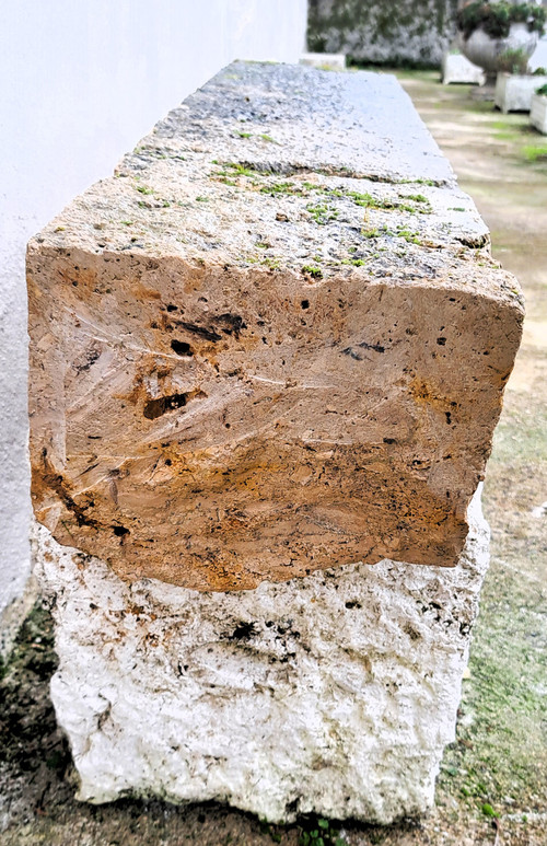 Rustic garden bench made from old stones