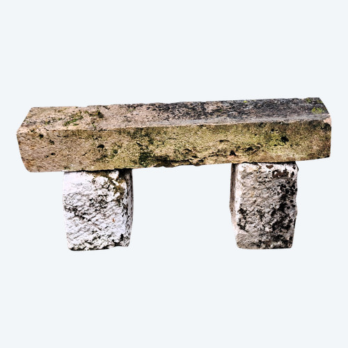 Rustic garden bench made from old stones