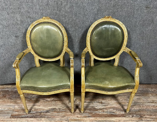 Pair of Louis XVI Cabriolet armchairs with medallion backs in ceruse wood from the 19th century