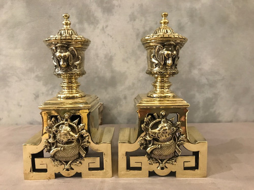 Pretty antique bronze andirons with animal decor from the 19th century