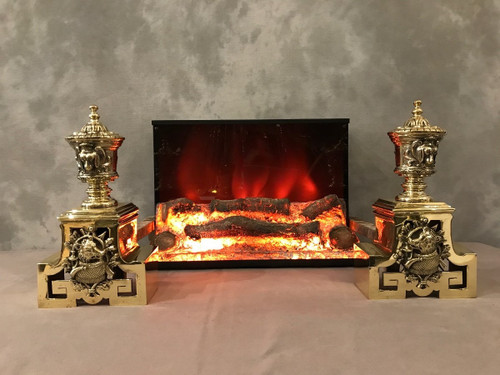 Pretty antique bronze andirons with animal decor from the 19th century