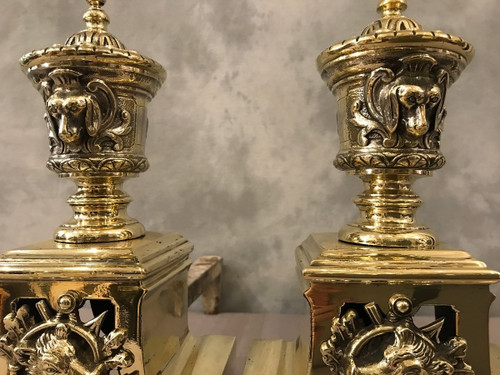 Pretty antique bronze andirons with animal decor from the 19th century